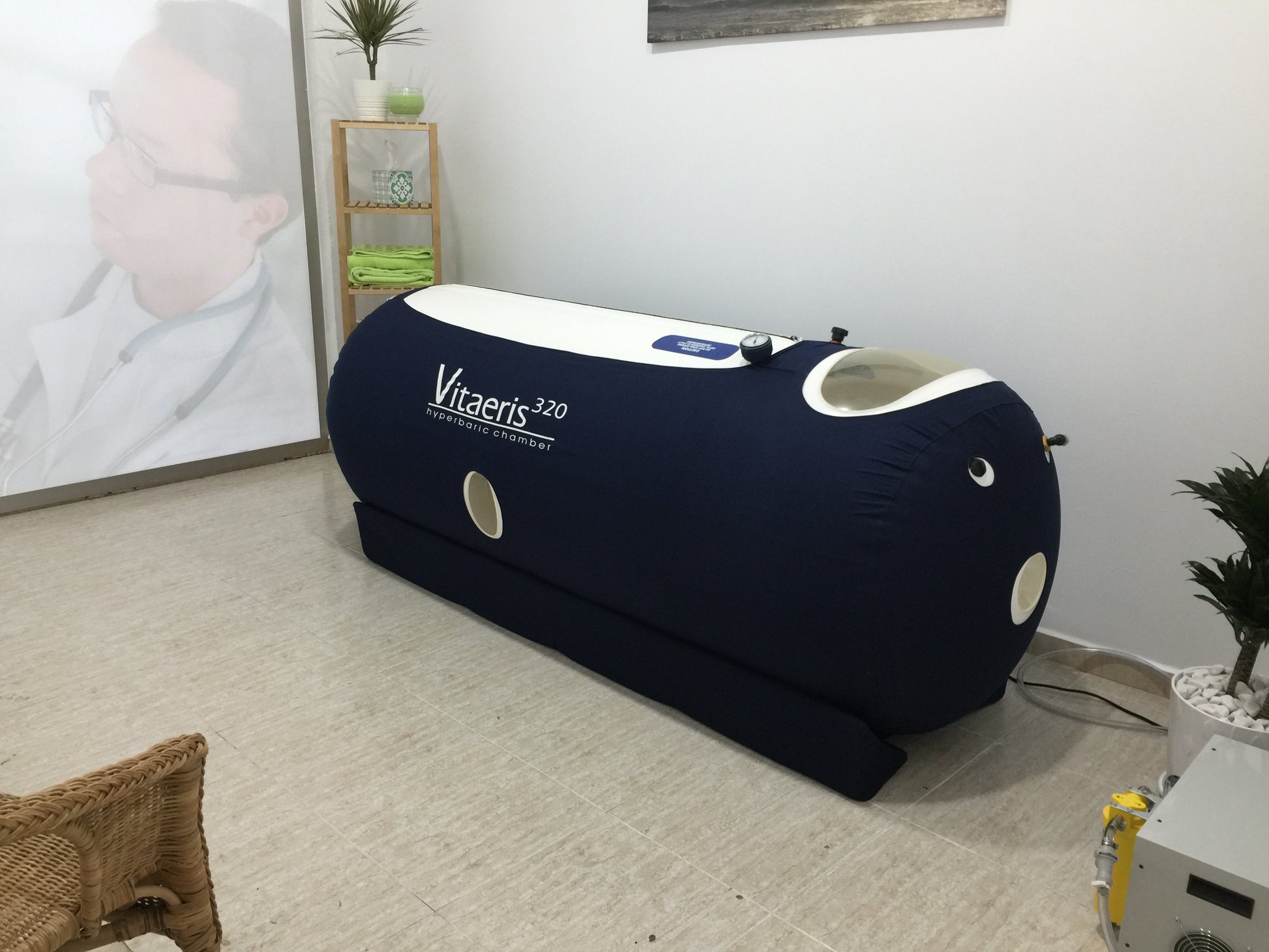 Vitaeris 320 hyperbaric chamber in a room with decor elements.