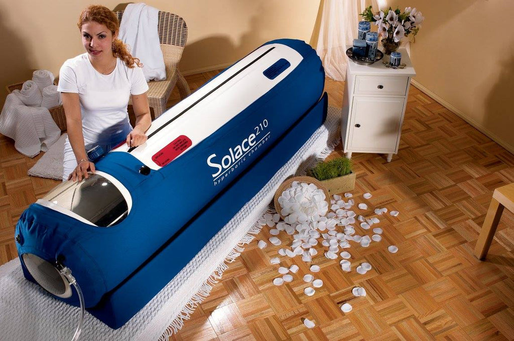 Person using Zerava Solace 110 hyperbaric chamber for oxygen therapy