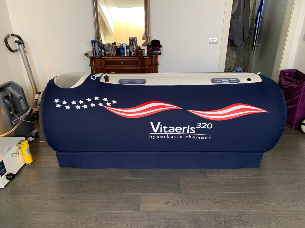 Vitaeris hyperbaric chamber in a room with furniture and equipment.