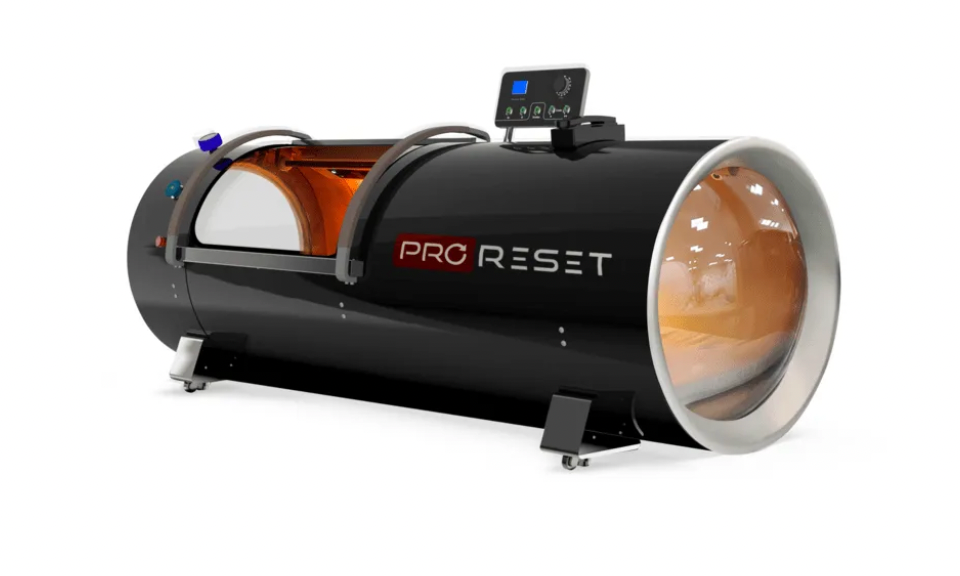 Side view of Orbit hyperbaric chamber showing sliding door and spacious interior